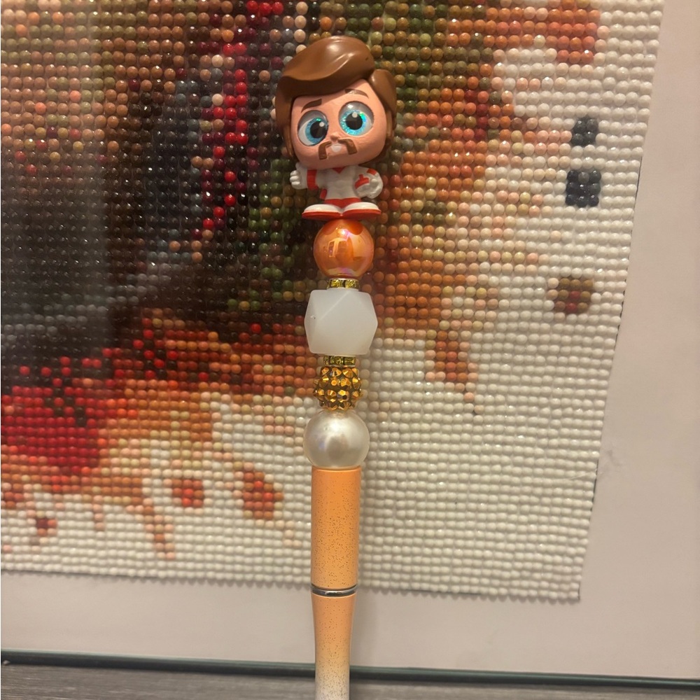 Colorful Beaded Pen with Duke Caboom Topper